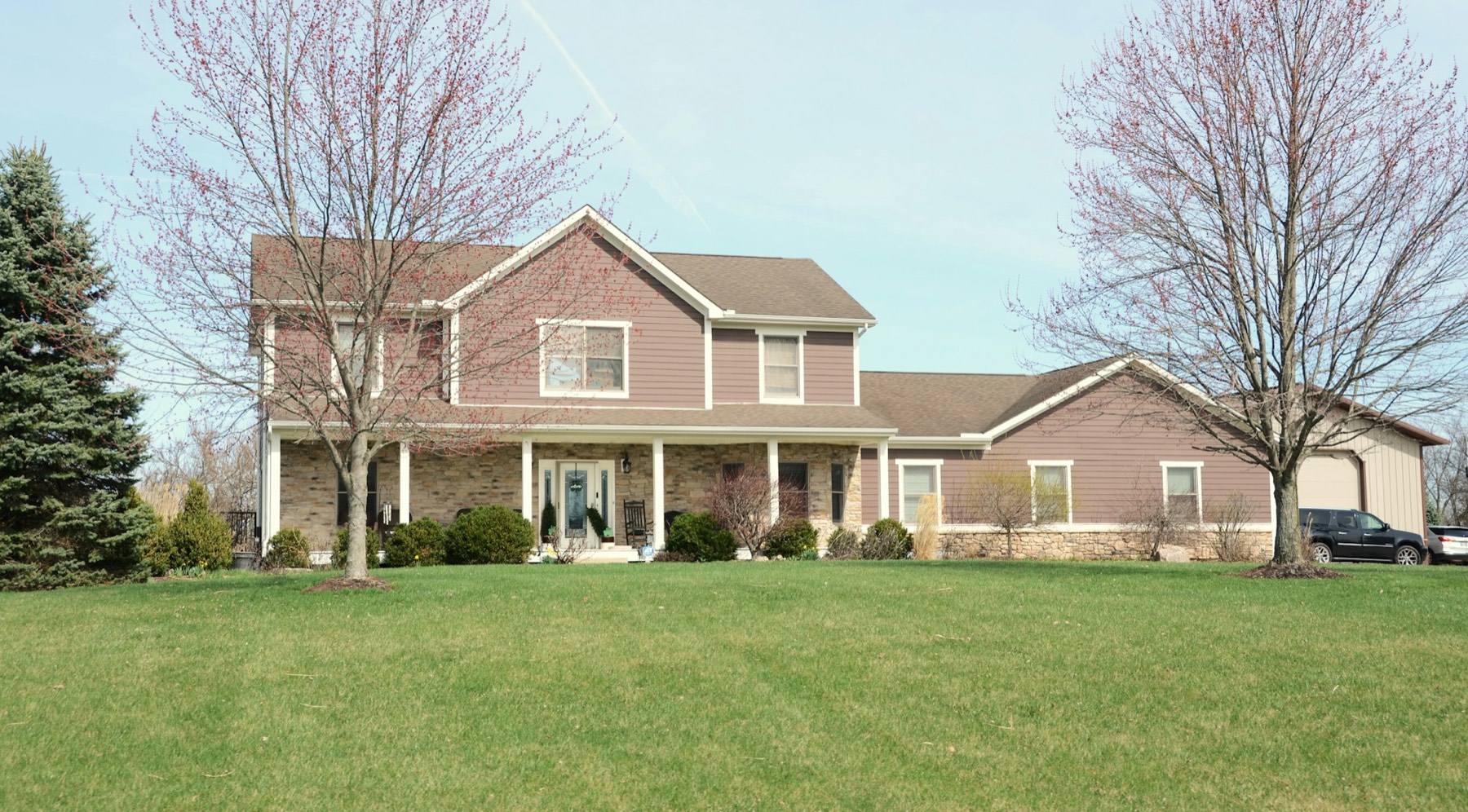 A suburban family home with a lawn